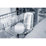 JURA Glass milk container (72570) in dishwasher rack among cups and plates, transparent jar with lid and tube