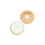 Aquafloow 500 ml jar in a white silicone sleeve — two bamboo lids with white silicone inserts shown from the front