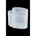 JURA Milk system cleaning container (24219) transparent plastic container with markings and small tube on a black background